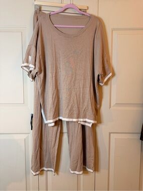 Beige Two-Piece Lounge Set with White Trim